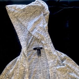 Lightweight long lines knit cardigan with hood.